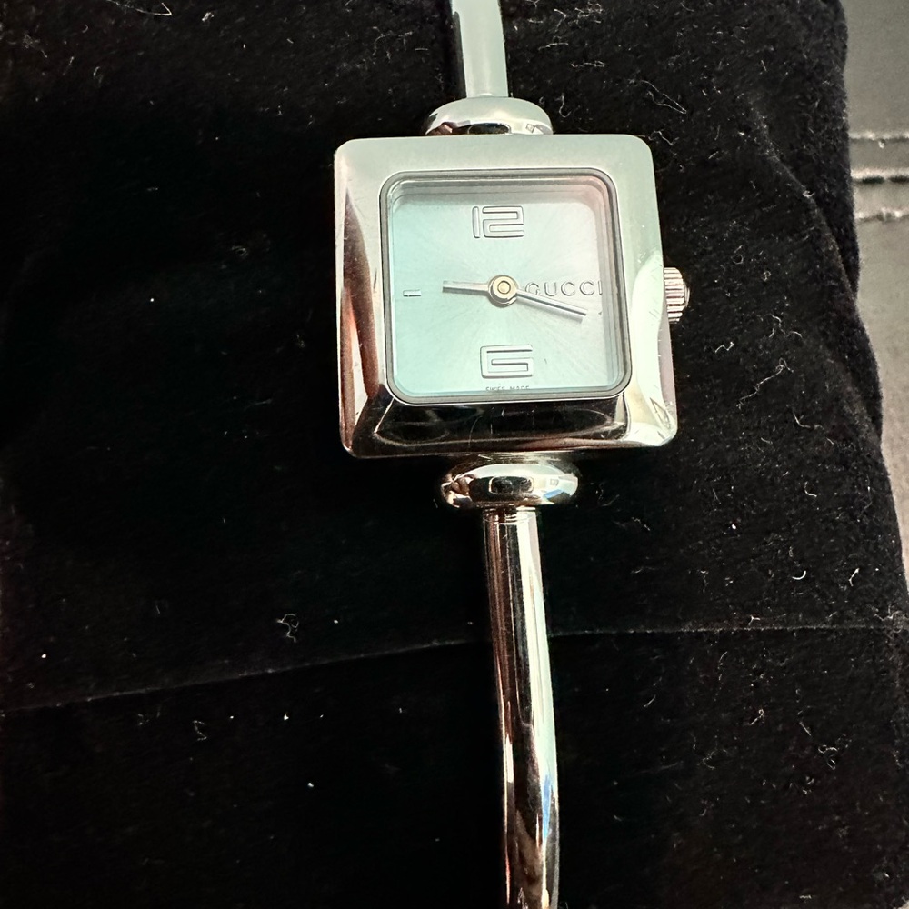 Gucci silver blue face watch